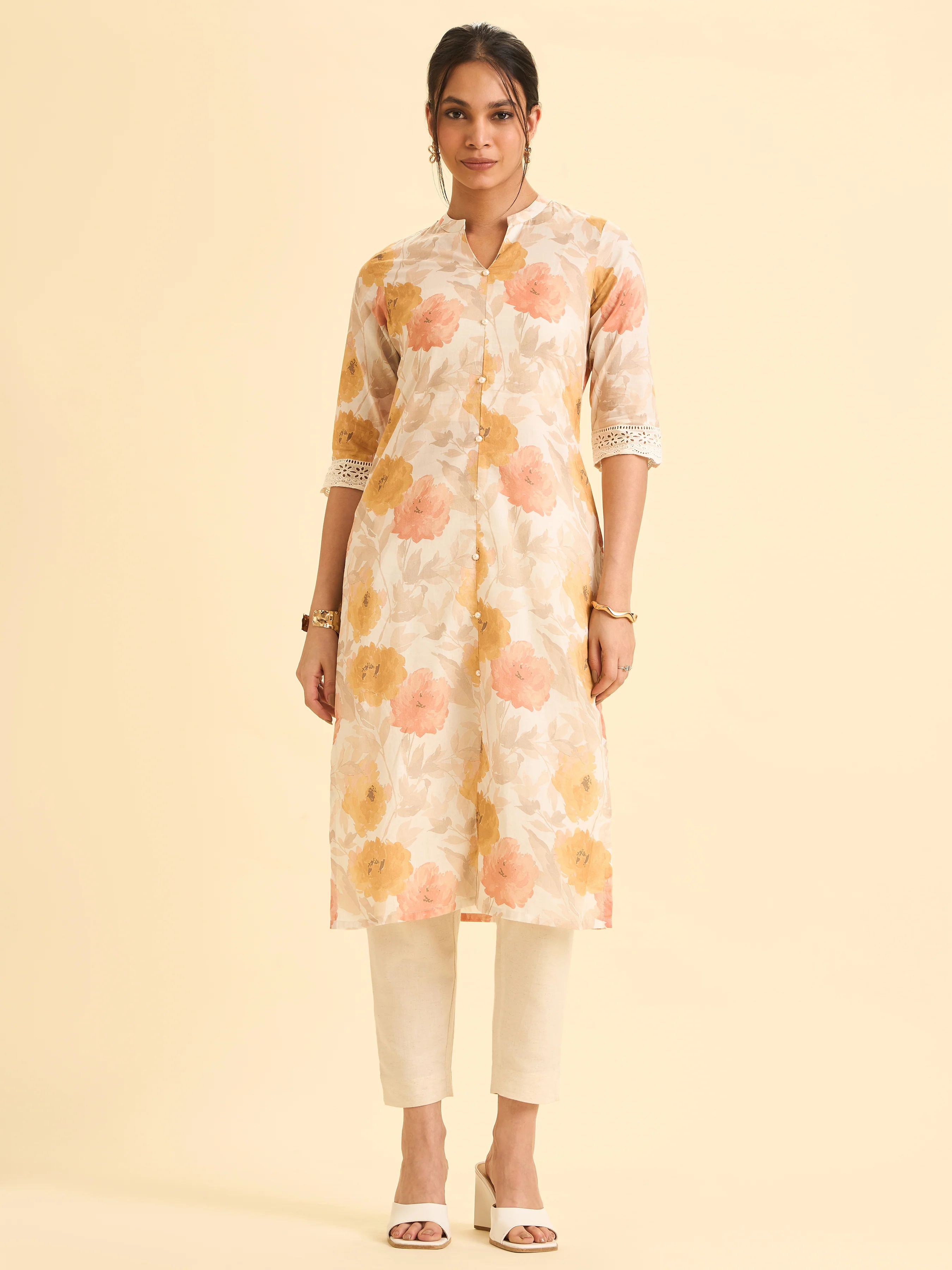 Ivory And Mustard Yellow Pure Cotton Printed Slitted Kurti With Lace